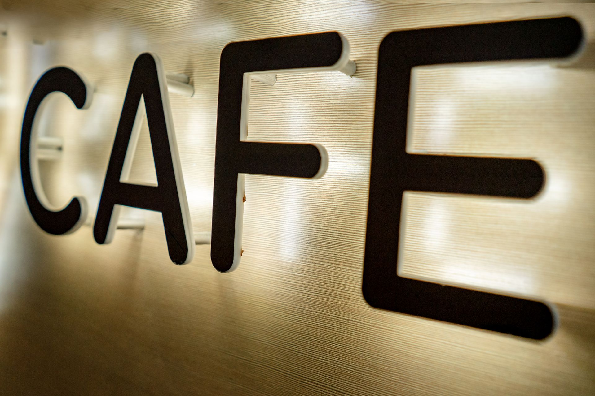 Backlit café light box sign
