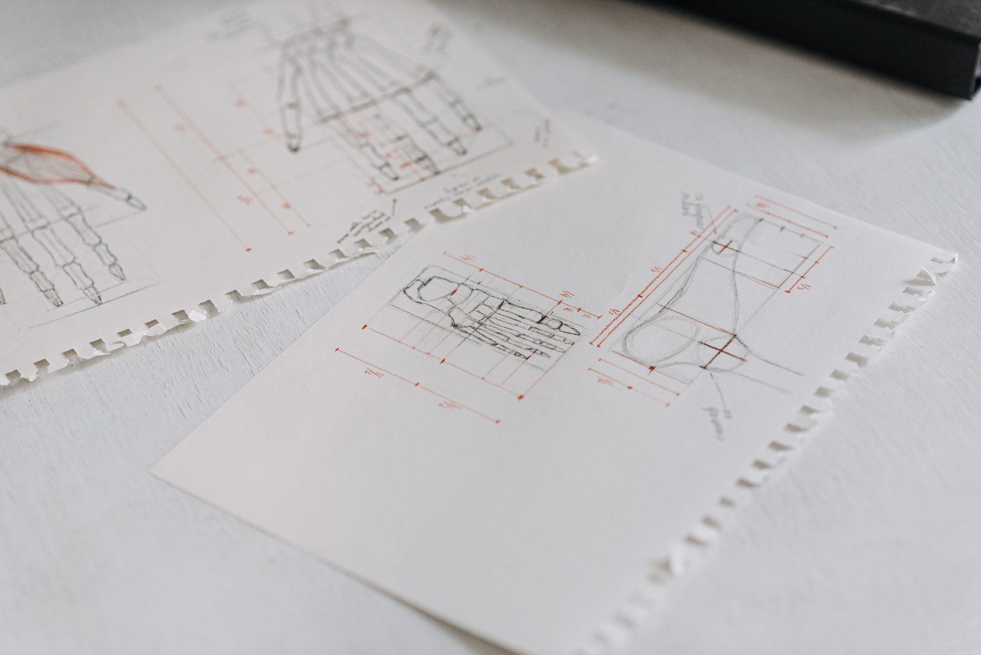 Technical drawings on paper sheets