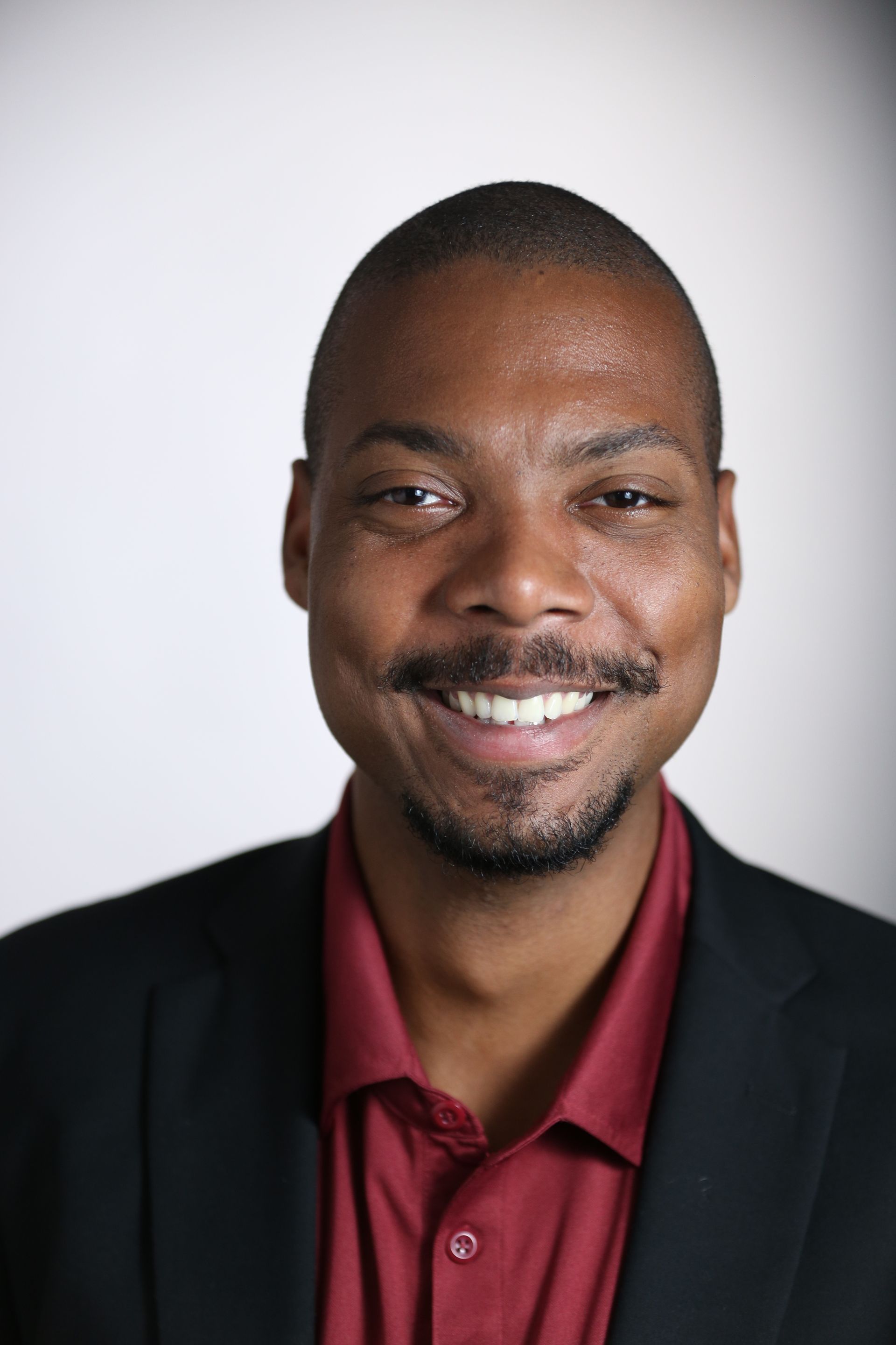 Portrait of a smiling man in a suit